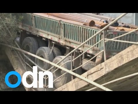 bridge - A truck has caused a small bridge to collapse in east China's Zhejiang Province. Report by Sophie Foster.