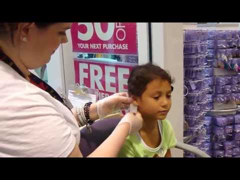 pierced - After lots of begging, Julia finally got to get her ears pierced.