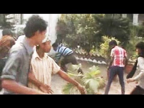 District Collector - Congress MP and Minister of State for Railways Adhir Ranjan Choudhury today led a mob of party workers into the house of a senior government officer, ransack...