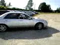Sean rally driving a Subaru