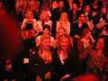 kim cattrall sits next to vivenne westwood during the final show for the mercedes benz berlin fashion week 2008 for the winter 2009 collection. this show was a retrospective of her work post 1970s.