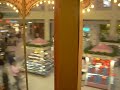 riding a carosel at White Oaks Mall