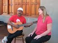 Lillian Hall and Brigido Soza singing