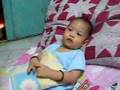 Covan watching Barney on TV