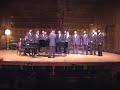 male chorus sings for william warfield scholarship at eastman theather in rochester new york directed by thaddeus warfield who is one of william's brothers