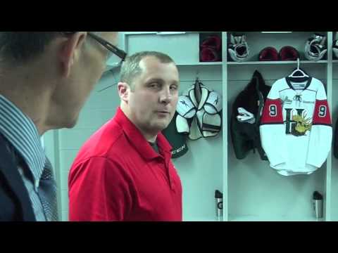 game tour - Halifax Mooseheads equipment trainer Chris MacDonald gives John Moore a tour of the team's room prior to their game with the London Knights at the 2013 Maste...