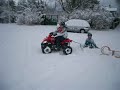My Quad with a sledge behind it!!