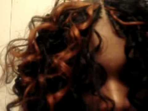 This is a latin curl quick weave with an invisible part. it is a response to 