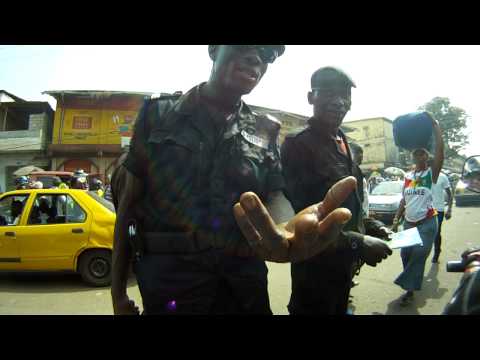 Conakry - Hot, humid, and stuck in the traffic jam upon arrival in Conakry and on top the police was harassing us.