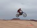 atvs, 4 wheelers, and motorcycle jumping at white wash sand dunes,utah funco atvs, 4 wheelers, and motorcycle jumping at white wash sand dunes,utah funco