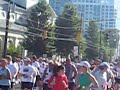 Running in the Peachtree Road Race - www.RunningBillboard.com