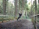 Christine lands from a zip line