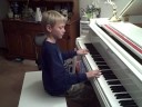 Joel, Age 10, Plays Boogie Woogie Rock, by Mike Springer