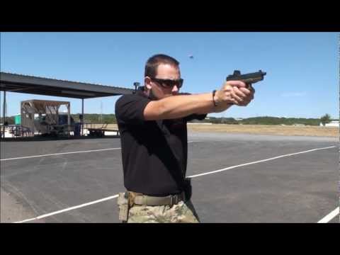 how to properly hold a pistol