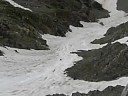 Erich glissading down Torreys