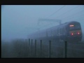 x2 class 322's, 66176 and voyager passing a foggy prestonpans