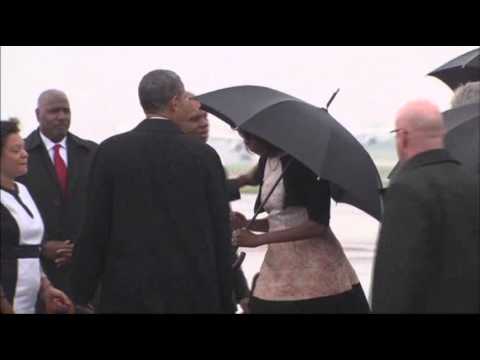 RAW - President Barack Obama arrived in South Africa on Tuesday for former South African President Nelson Mandela's memorial. (Dec. 10)
