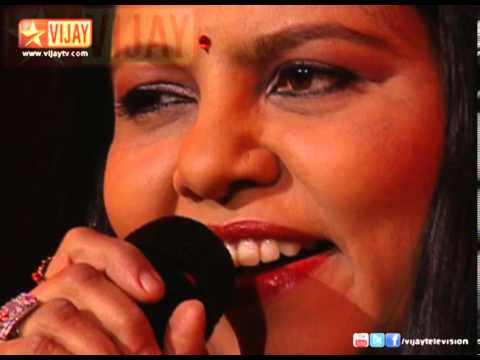 Sadhana Sargam and Hariharan are singing Nee Partha Paarvai