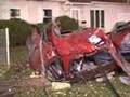 CAR CUT IN HALF AFTER HITTING TREE