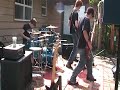 Prisom, featuring Davis Carlin on lead guitar, Jordan Cope on bass, and Nathan Anderson on drums, played a set at the Memorial Day (2007) Rock and Roll Bash in 