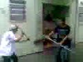 Breno e Gilmar brincando com cabos de vassouras (bastão .-.) kk -