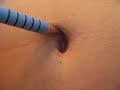 Painting my belly black..... Painting my belly black.....
