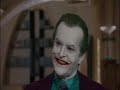 joker finds vicki vale at her place while bruce is there.
