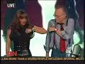 Janet Jackson teaches Larry King how to dance