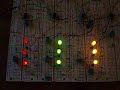 Three parallel filters built with 741 op amps filter an audio signal into three pass bands:  less than 160 Hz,    250 Hz to 2.5 kHz, and greater than 3 kHz. The output signal from each is divided along the gates of three 2N7000's each controlling an LED.