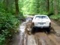 subaru with swampers, in the mud