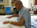 Quadriplegic Masi Sala balances uses stomach and arms to sit up