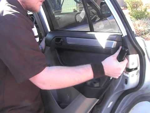 how to remove corsa b door panel