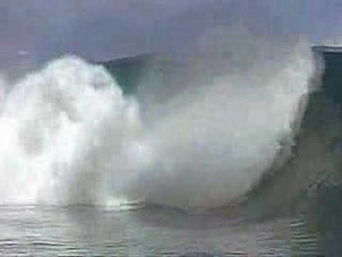 Laird Hamilton surfing Teahupoo in Tahiti