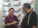legendary jazz bassist, rufus reid, chats with waer music director, eric cohen, prior to going on stage at jazz in the square 2007.