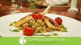 Gebratenes Saiblingsfilet mit Copa an Kräuterpesto und Gemüse-Graupenrisotto