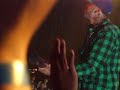 travie plays his guitar