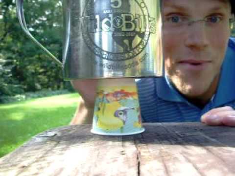 AdamCWM - Here's a new trick you can all try with your bullwhip or stockwhip. All you need is a table or stool, a Dixie cup, and a mug with a flat bottom. The bottom o...