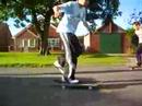 Sam falling off a skateboard