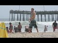 Surfer Walks Accross Beach.mov