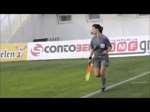The gorgeous female linesman distracting fans from the action