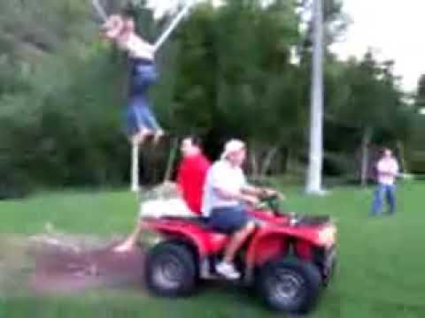 Girl trying crazy big horizontal bungee