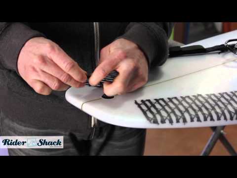 Attach - This video will explain how to properly attach a surfboard leash to a surfboard and explain the importance of a rail saver.