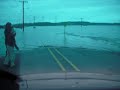 BMW drives to washed-out road block