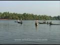 Sailing on a small boat around the backwaters of ...