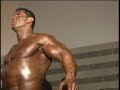 Bodybuilder Paco Bautista pumping backstage