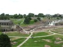 the falls park on the big sioux river in sioux falls, sd showing the old queen bee flour mill