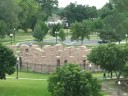 the falls park on the big sioux river in sioux falls, sd showing the old queen bee flour mill