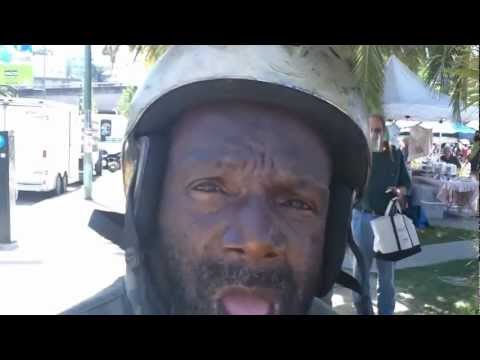 OutsiderArtwork - Golden Gregory Wells rides a golden chariot bike around Oakland, California. Wells intends to build a personal flying saucer. His designs and models are crud...