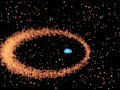 A zoom diving deep into the nucleus of the Andromeda Galaxy (M31) then dissolving into an animation of a concentration of red stars. Pushing deeper into the animation reveals a disk of young blue stars swirling around a black hole. Hubble's Space Telescope Imaging Spectrograph (STIS) revealed this disk of young blue stars that were swirling around a black hole in M31 in much the same way that the planets in our solar system revolve around the Sun. Astronomers are perplexed about how the pancake-shaped disk of stars could form so close to a giant black hole. In such a hostile environment, the black hole's tidal forces should tear matter apart, making it difficult for gas and dust to collapse and form stars. The observations, astronomers say, may provide clues to the activities in the cores of more distant galaxies.