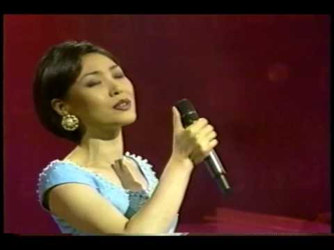 周炫美/何日君再来